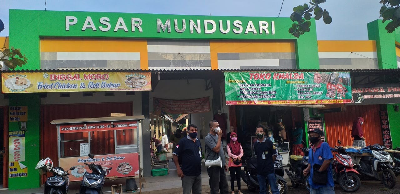 Sosialisasi Dalam Rangka Pencegahan Covid-19 di Pasar Daerah